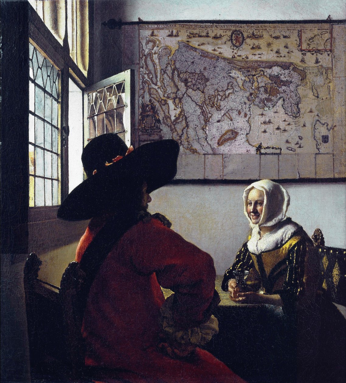 Betjent og en latterjente av Jan Vermeer van Delft