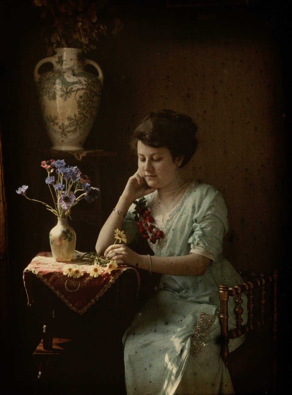 Kvinne med blomster av Johannes Hendrikus Antonius Maria Lutz