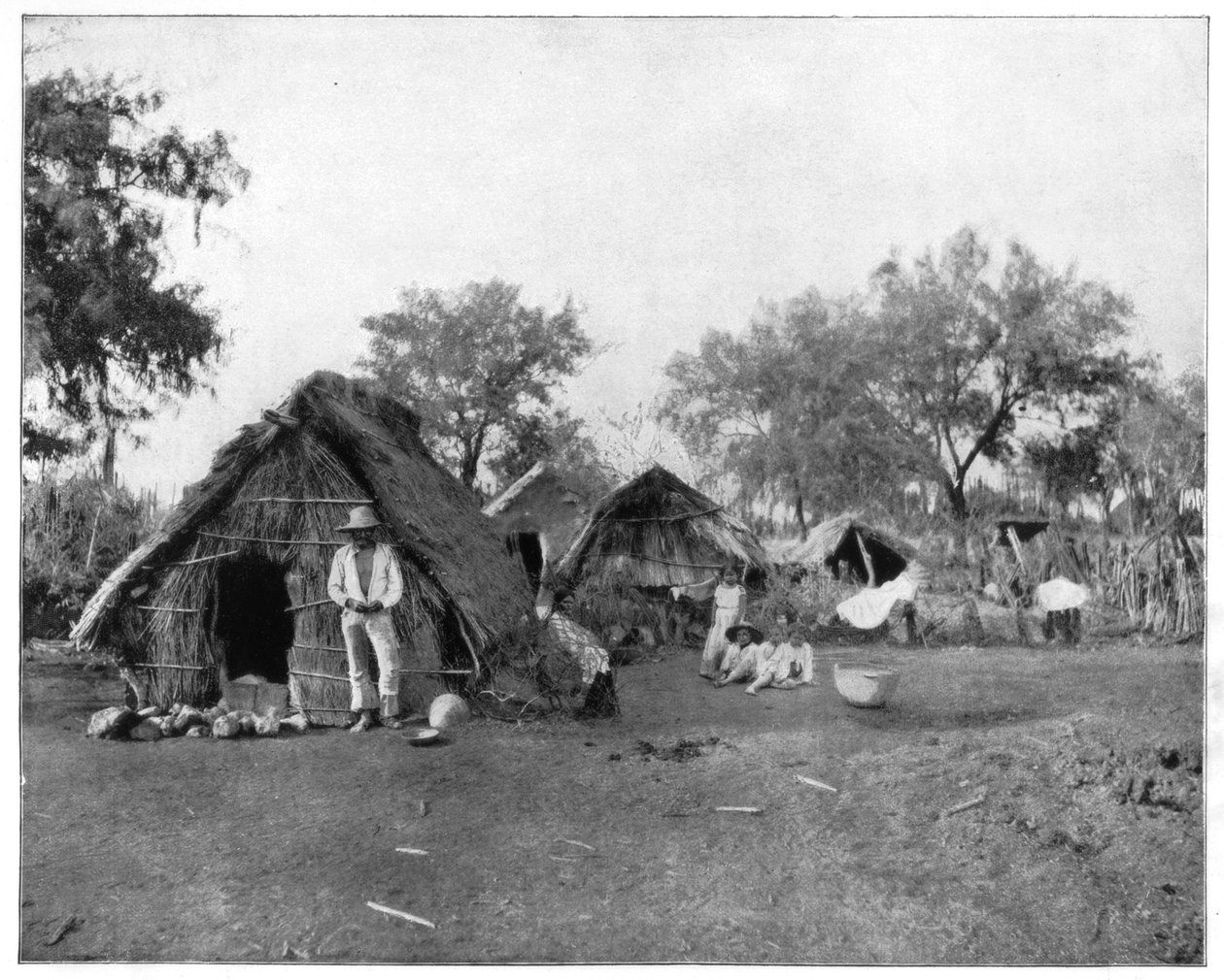 Halmhytter, Salamanca, Mexico, sent på 1800-tallet. av John L. Stoddard
