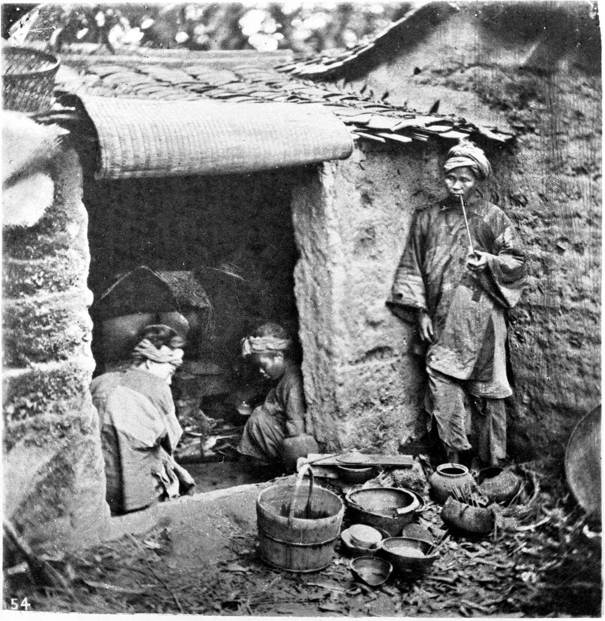 Kina, en enkel familie, ca. 1870 (bilde) av John Thomson