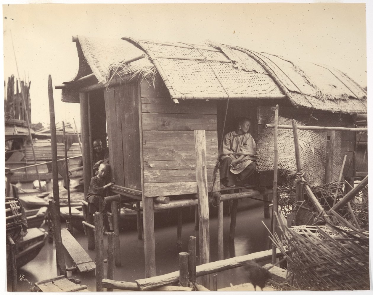 Bolig på vannet, Kanton av John Thomson
