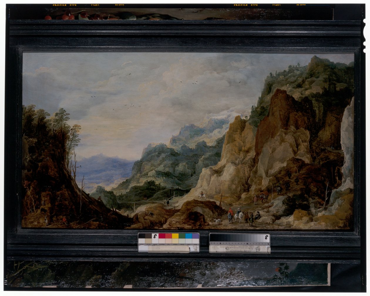 Et panoramisk fjellandskap med svenner som gir til de fattige, pakkehester bortenfor av Joos or Josse de The Younger Momper