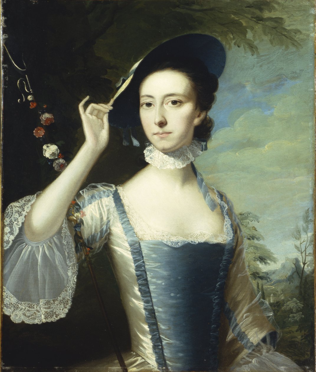 Portrett av en dame ved en krans av blomster, i et landskap av Joseph Wright of Derby