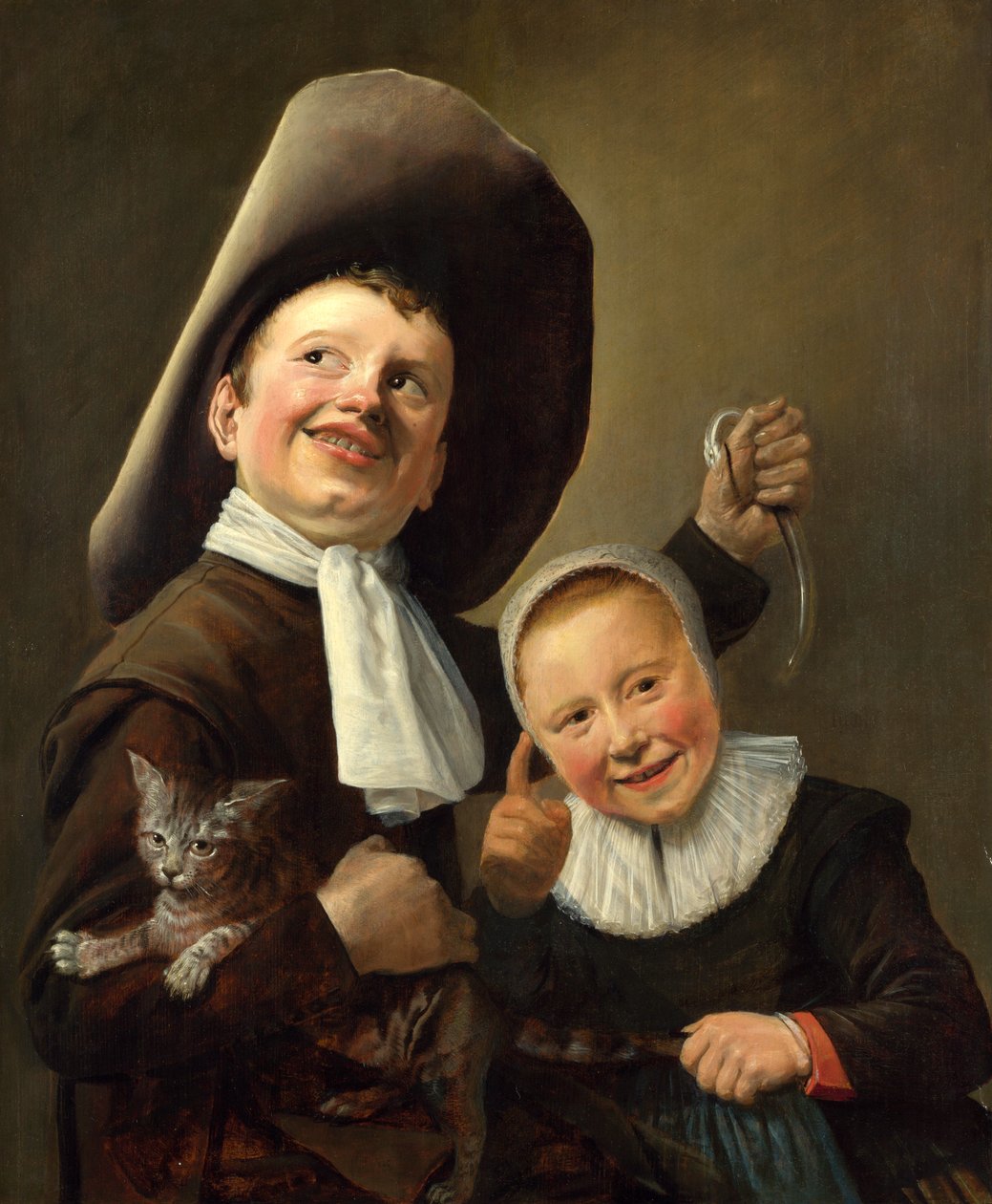 En gutt og en jente med en katt og en ål av Judith Leyster