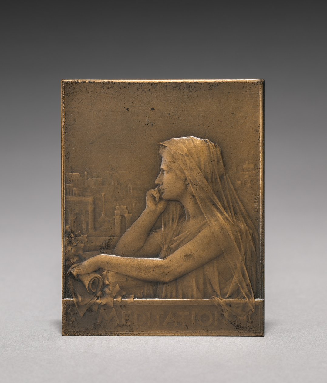 Medaljong på forsiden. av Jules Dupré