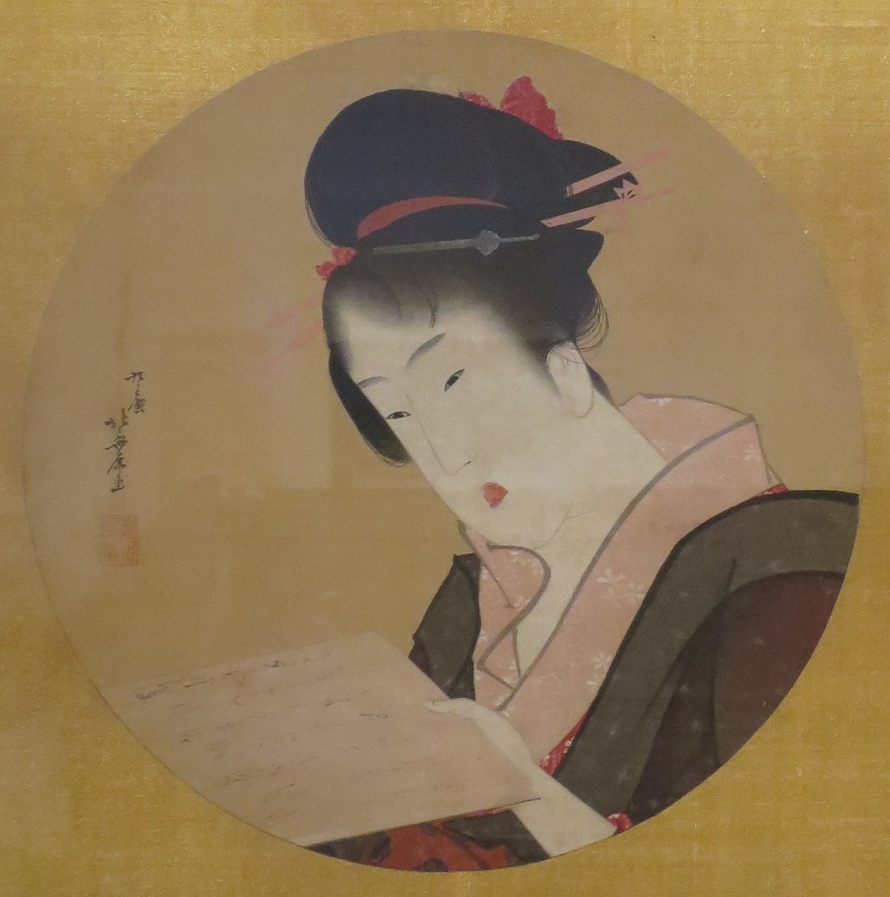 Kvinne som leser et brev av Katsushika Hokusai