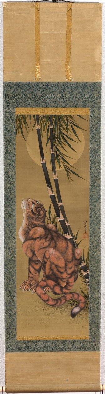 Tiger blant bambusen som ser på fullmånen av Katsushika Hokusai