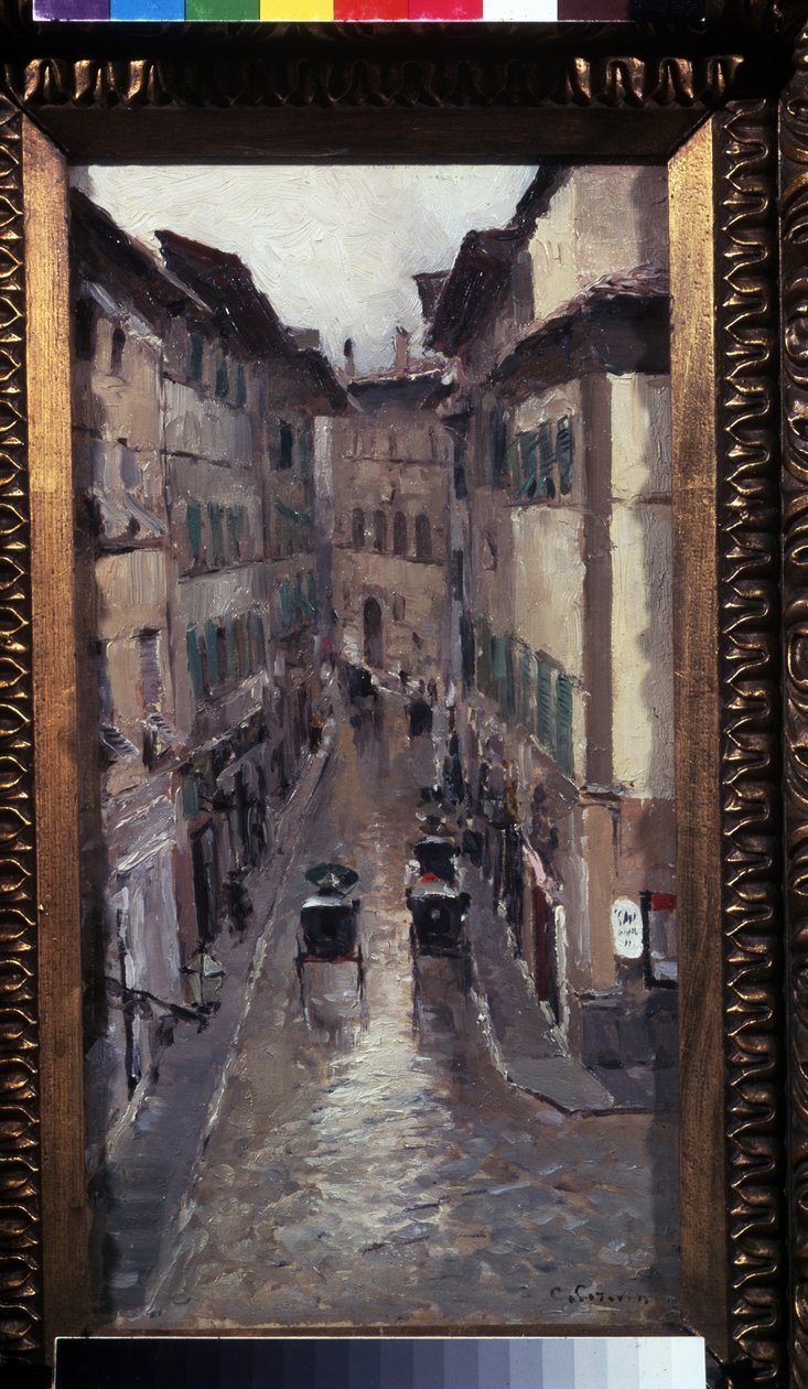 Regn i Firenze (Regn i Firenze). Beskrivelse av en gate i middelaldersentrum av byen Toscana (Italia). Maleri av Konstantin Alexeyevich Korovin (Constantin Korovin) (1861-1939), olje på lerret av Konstantin Alekseevich Korovin