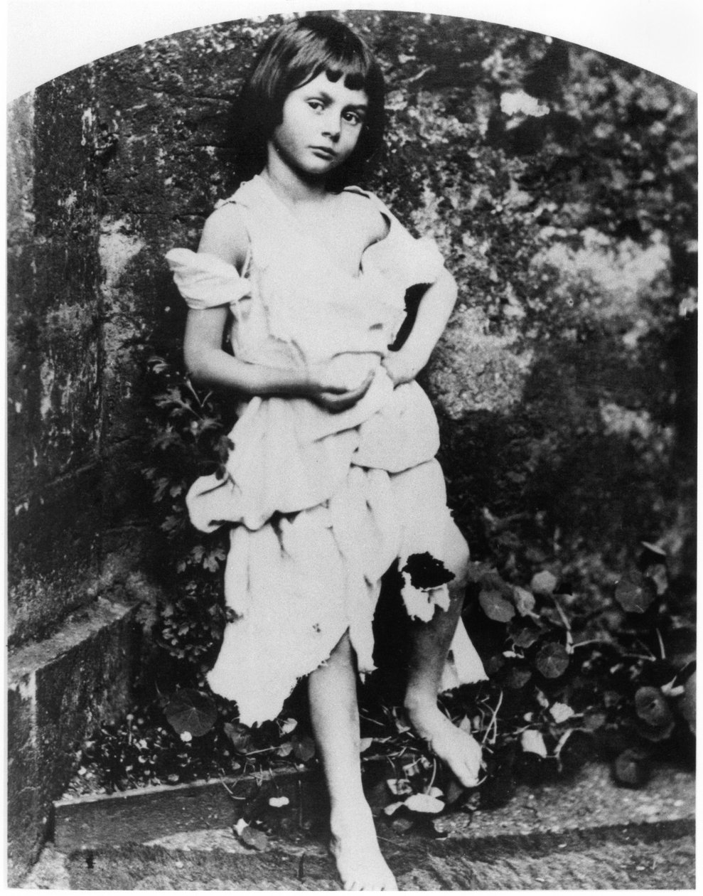 Alice Pleasance Liddell (1852-1934) som tiggerpiken av Lewis Carroll