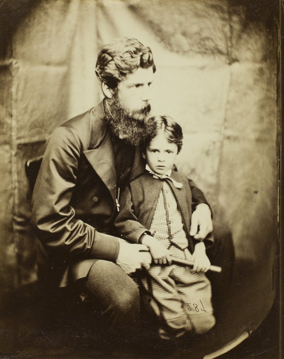 Pastor James Langton Clark og sønnen Charles av Lewis Carroll