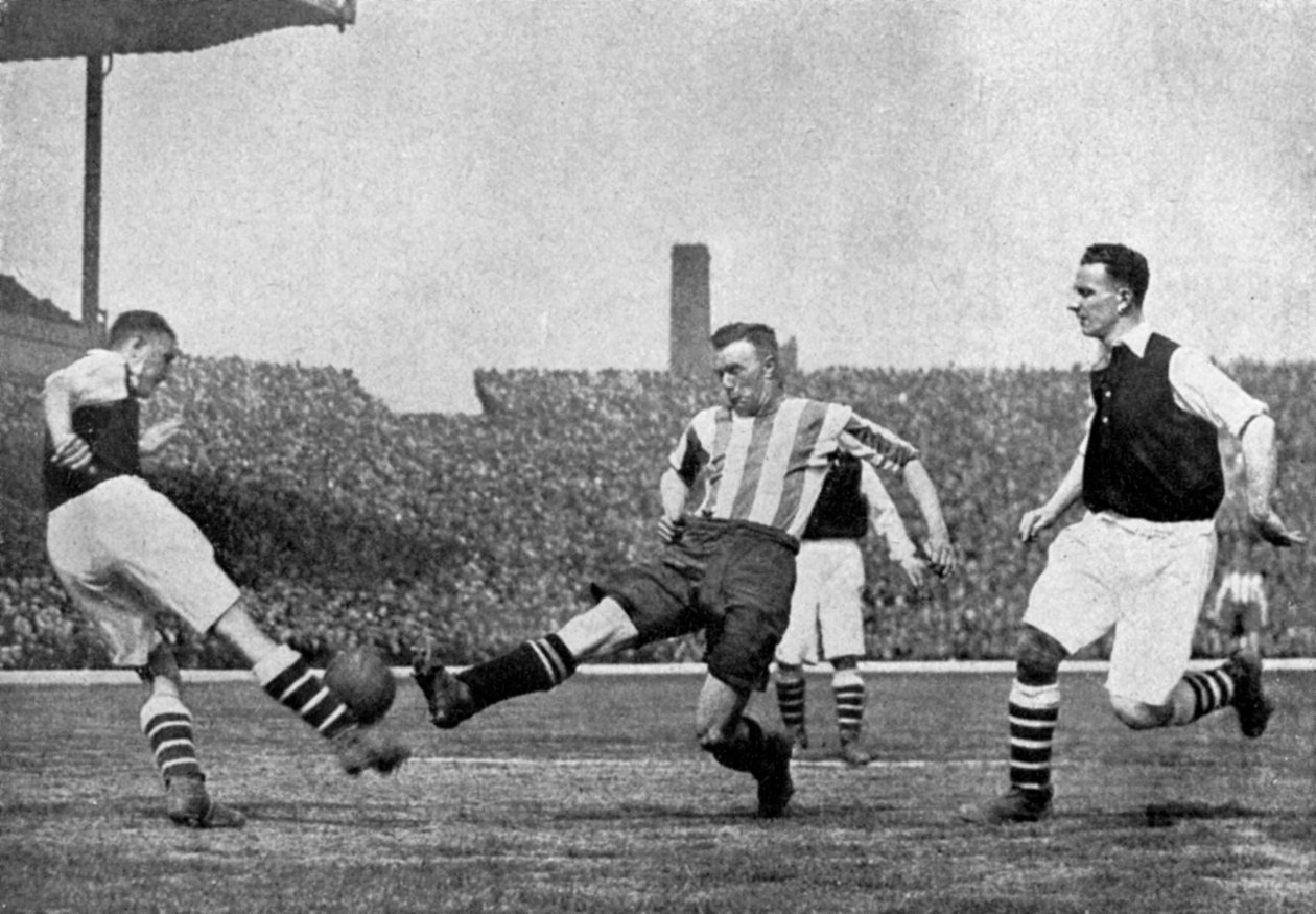 Action fra en Arsenal mot Sheffield United fotballkamp, c1927-1937. av London News Agency