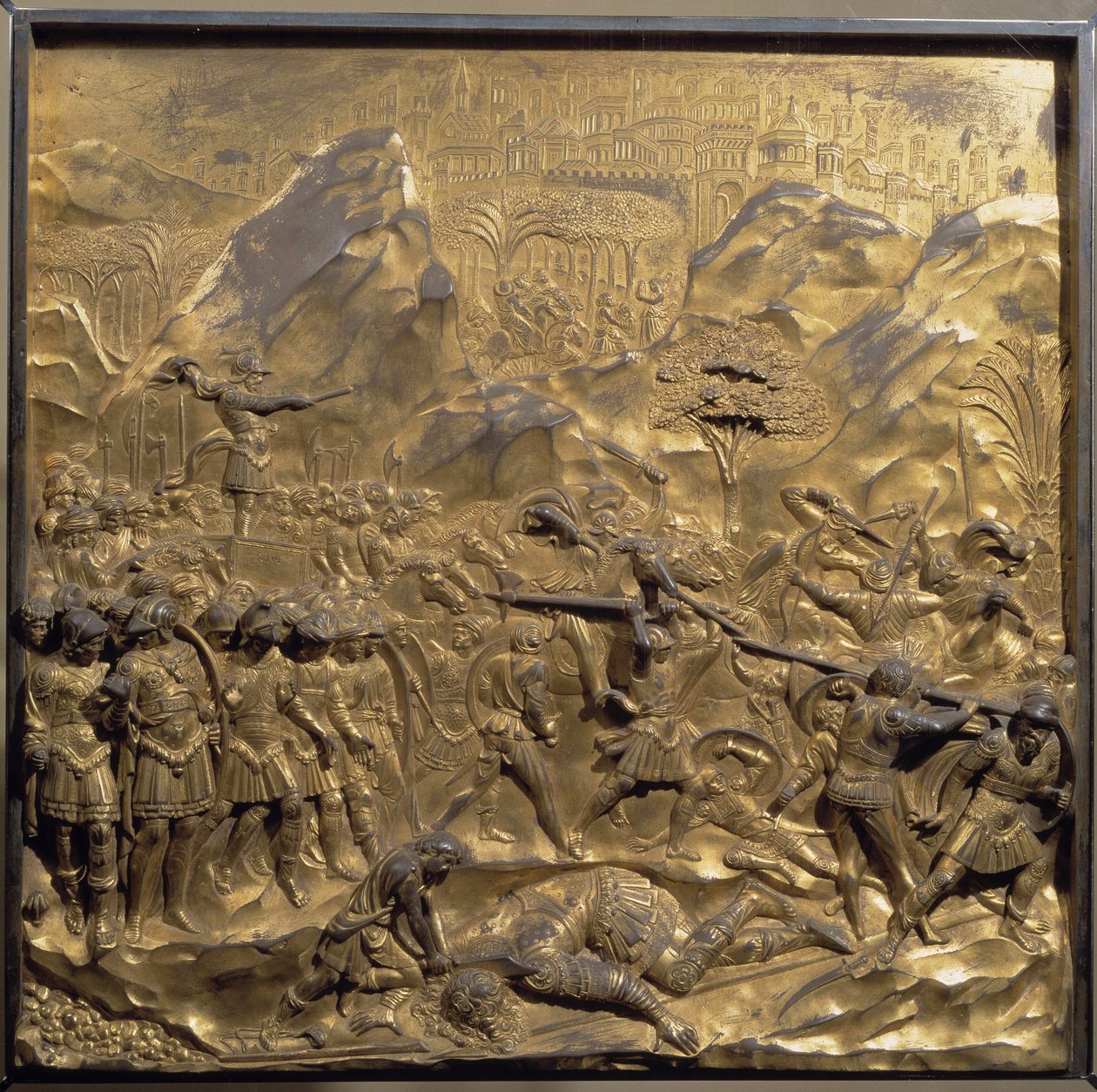 Livet til David og Goliat: en representasjon av slaget mellom israelittene og filisterne og halshuggingen av giganten Goliat i Ela-dalen av Lorenzo Ghiberti