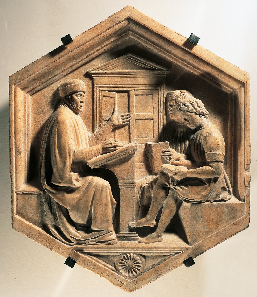 Den lærde Priscian, underviser to studenter av Luca Della Robbia