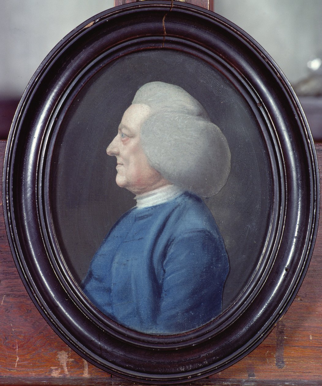 Portrett av en mann iført en blå frakk av Lucas Bateman