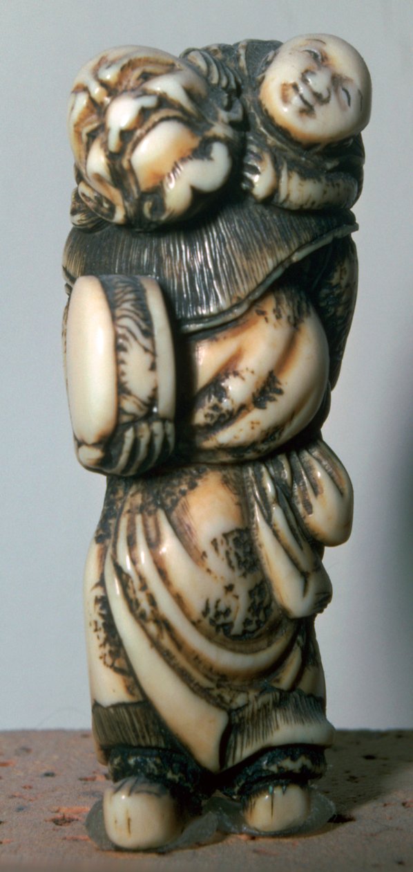 Japansk Netsuke av en kinesisk danser og barn, 1700-tallet. av Masahira