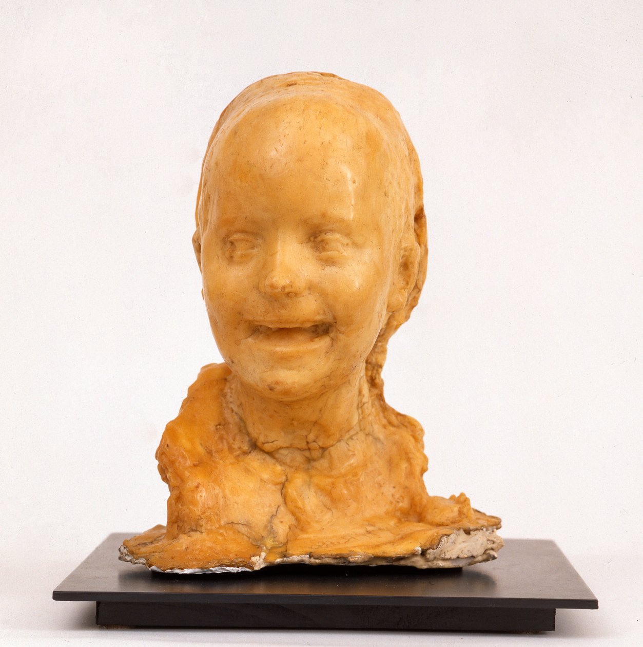 Den lille latteren av Medardo Rosso