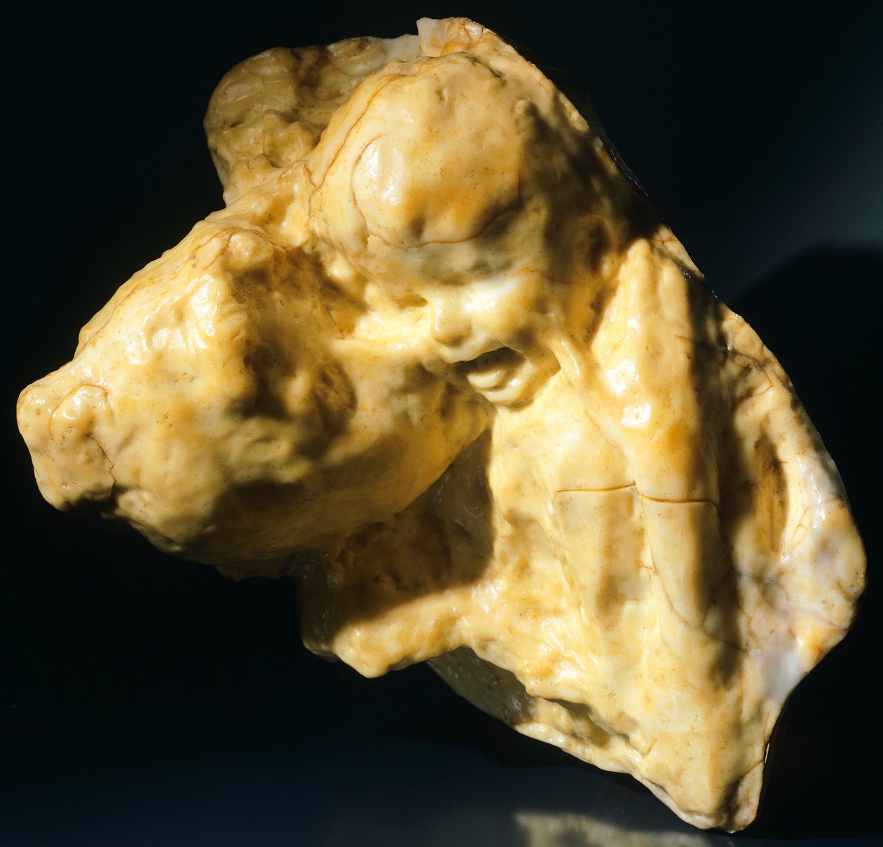 Moderskap, gullalderen, av Medardo Rosso (1858-1928). av Medardo Rosso