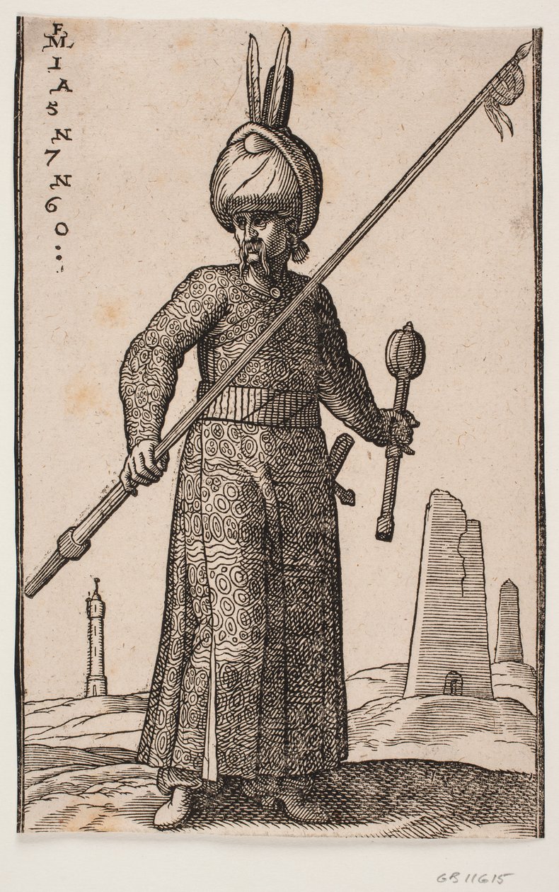 Stående soldat, sett forfra; i høyre hånd en lanse med en vimpel på spissen; i venstre hånd, en kølle; på hodet en turban med to fjær; i landskapet, et «fyrtårn» og et par obelisklignende bygninger av Melchior Lorck