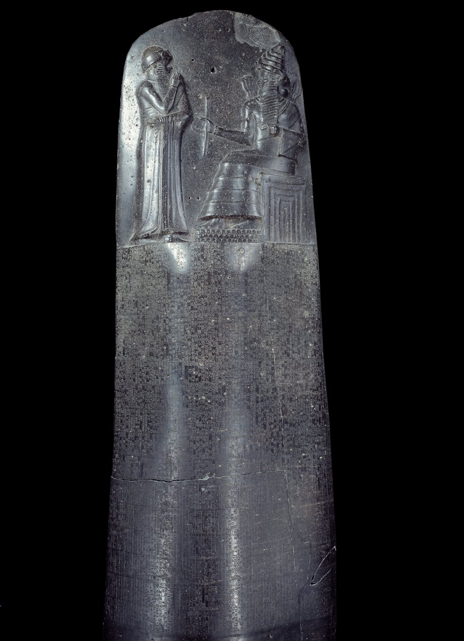 Mesopotamia: stele i dioritt av lovkodeksen til Hammurabi (eller Hammourabi). Den er dekket med kileskriftinskripsjoner og på toppen står kong Hammurabi foran solguden i Mesopotamia, Shamash, rettferdighetens guddommelige. Det er et av de eldste stykkene o av Mesopotamian