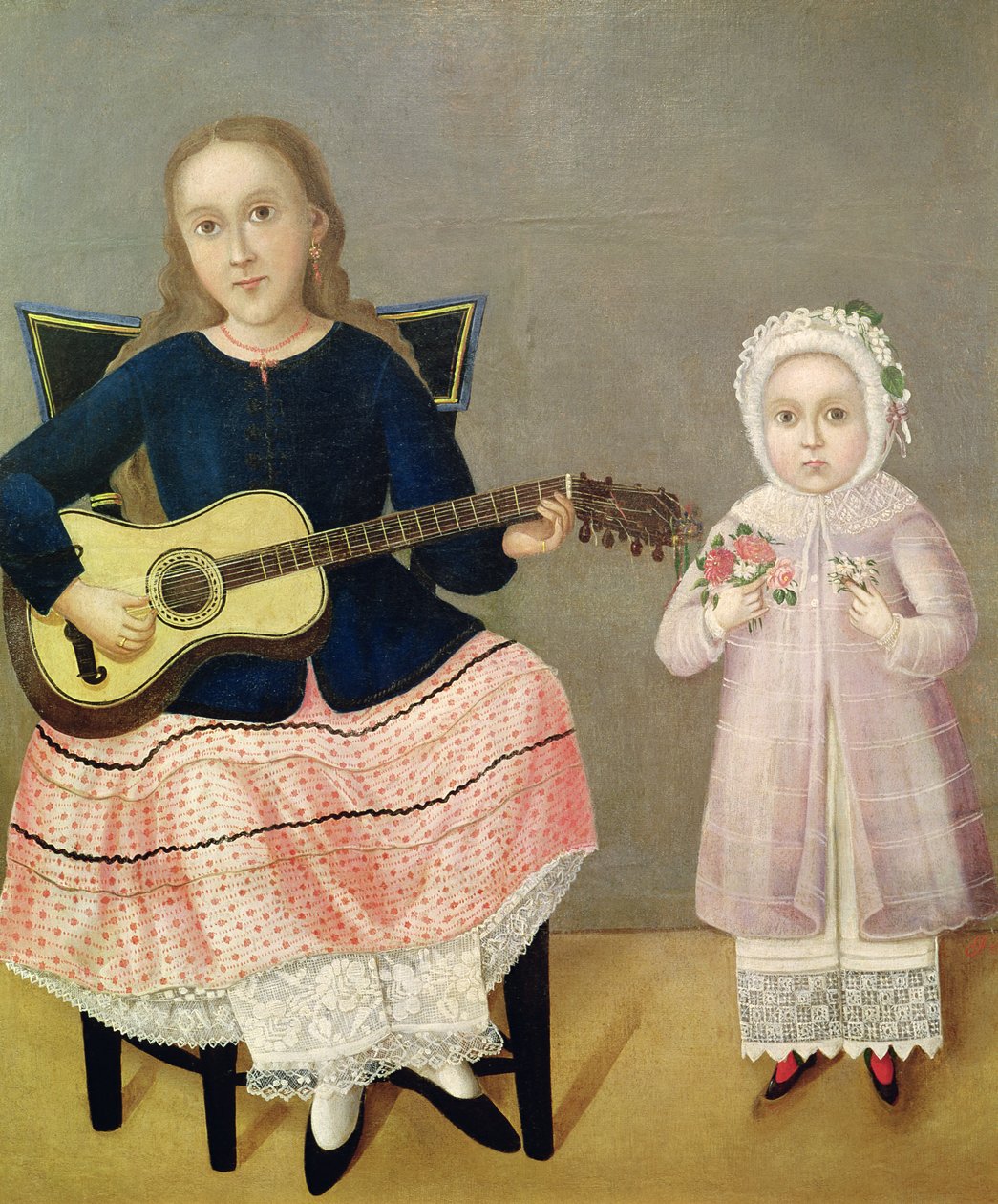 Ung jente med gitar og barn med bukett av Mexican School