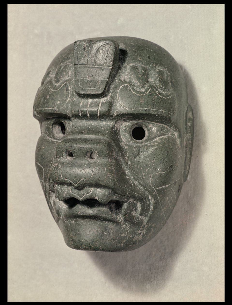 Feline maske av en mann, fra Oaxaca, Pre-Columbian (jade) av Mexican School