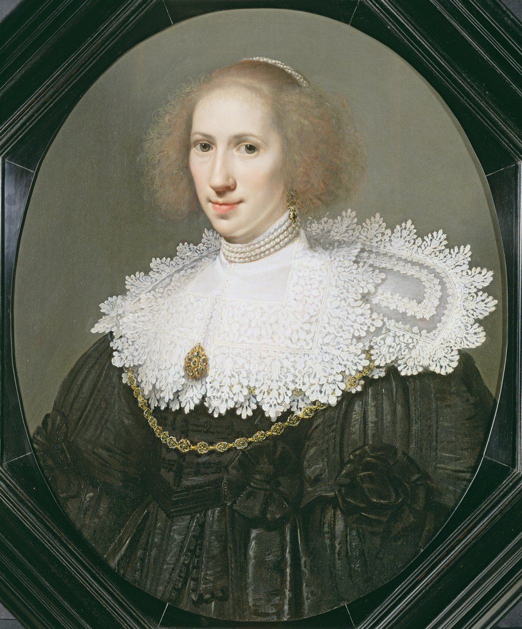 Portrett av en dame med blondekrage og perler av Michiel Jansz van Miereveld