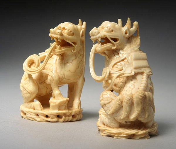 Par utskåret Qilin (se også 272189) av Ming Dynasty Chinese School