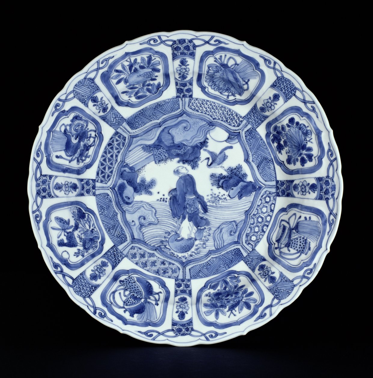 Blått og hvitt kraakfat malt med Li Tieguai som krysser havet på en dobbel kalebass, Wanli-periode, 1594-1610 (porselen) av Ming Dynasty Chinese School