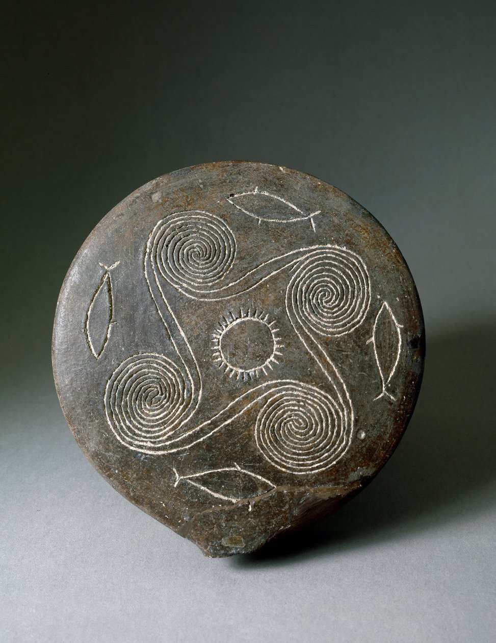 Minoisk kunst: sirkulær skive av Naxos i terrakotta. Minoisk sivilisasjon. 2400-2000 f.Kr. Athen, Nasjonalt arkeologisk museum av Minoan