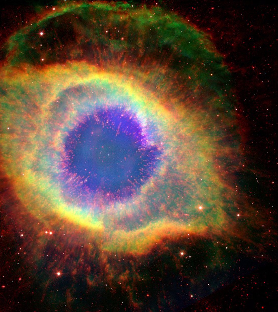 Helix-tåken (NGC 7293), noen ganger kalt The Eye of God, en stor planetarisk tåke i stjernebildet Vannmannen. Kreditt: NASA. av National Aeronautics and Space Administration National Aeronautics and Space Administration