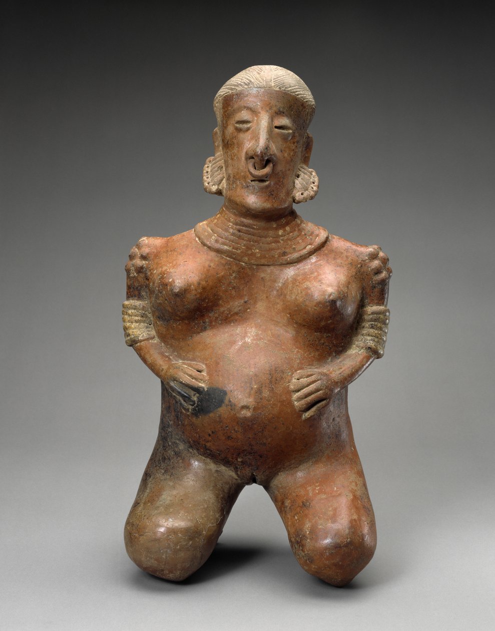 Knelende gravid kvinne, 300 f.Kr.-300 e.Kr. (keramikk med slip) av Nayarit Nayarit