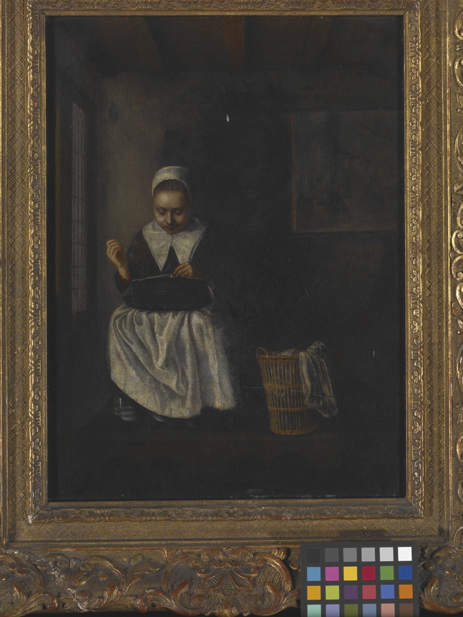 A Girl Sewing (olje på tre) av Nicolaes Maes