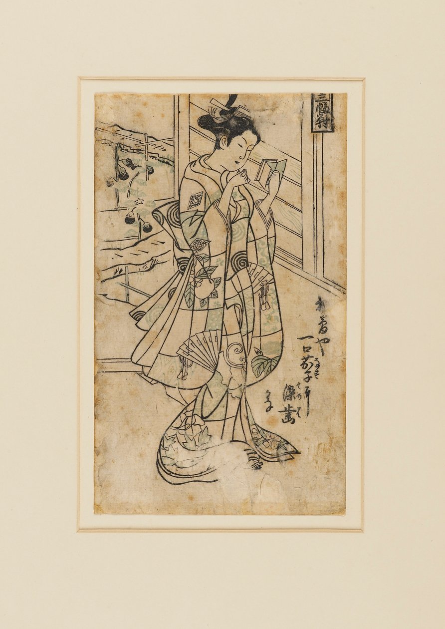 Treblokktrykk - Onoe Kikingoro I som kvinne som leser en bok, 1700-tallet av Okumura Masanobu
