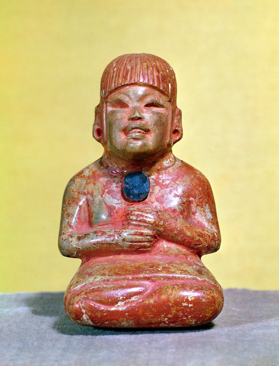 Sittende figur, muligens en av de tidligste representasjonene av guden for mais og glede, fra La Venta, Tabasco, førklassisk periode (polykrom jade) av Olmec