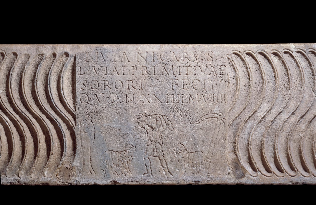 Paleochretian art: fragmentary sarcophagus tank: Good Shepherd and epitaph of Livia Primitiva. A shepherd with lambs, a fish (Christian symbol) and an anchor. Find in Rome under St. Peter