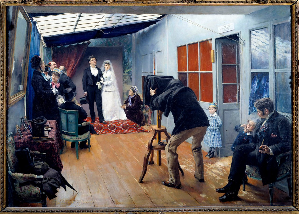 Et bryllup med fotografen i 1879 Et par unge bruder poserer i fotografstudioet. Maleri av Pascal Adolphe Jean Dagnan-Bouveret (1852-1929) 1879 Søn. 0,85x1,22 m Lyon, musee des Beaux Arts - Bryllupsfest i fotografens studio av Pascal Adolphe Jean Dagnan Bouveret