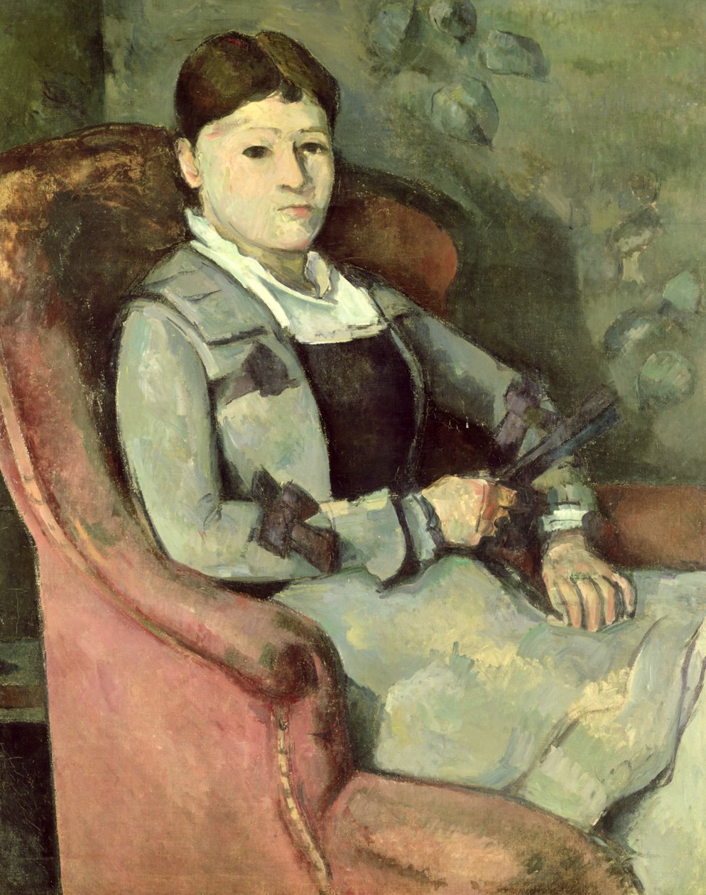 Kunstnerens kone i en lenestol, ca. 187888 av Paul Cézanne