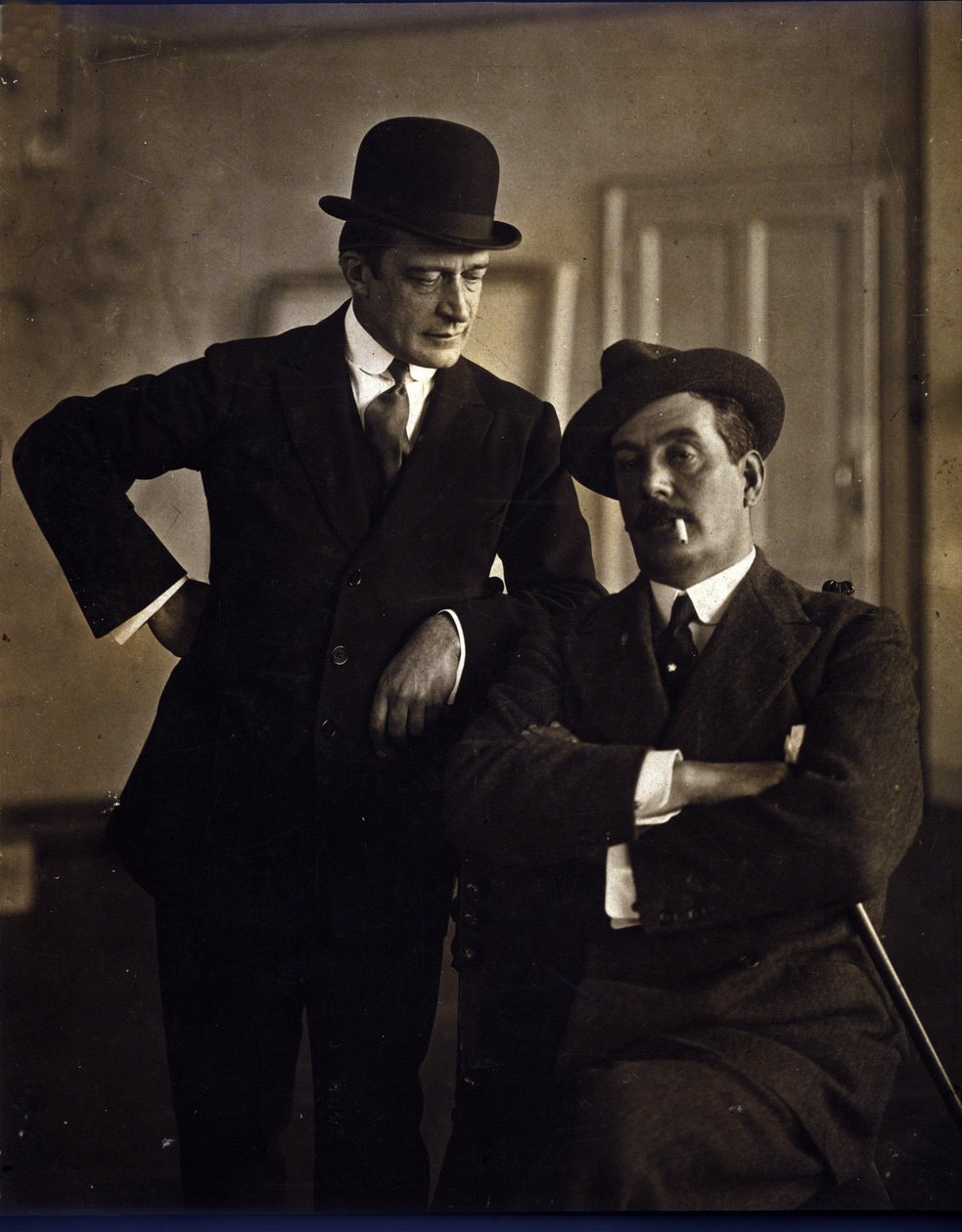 Komponisten Giacomo Puccini (1858-1924) og musikkforlaget Tito Ricordi II (1865-1933). av Photographer Italian