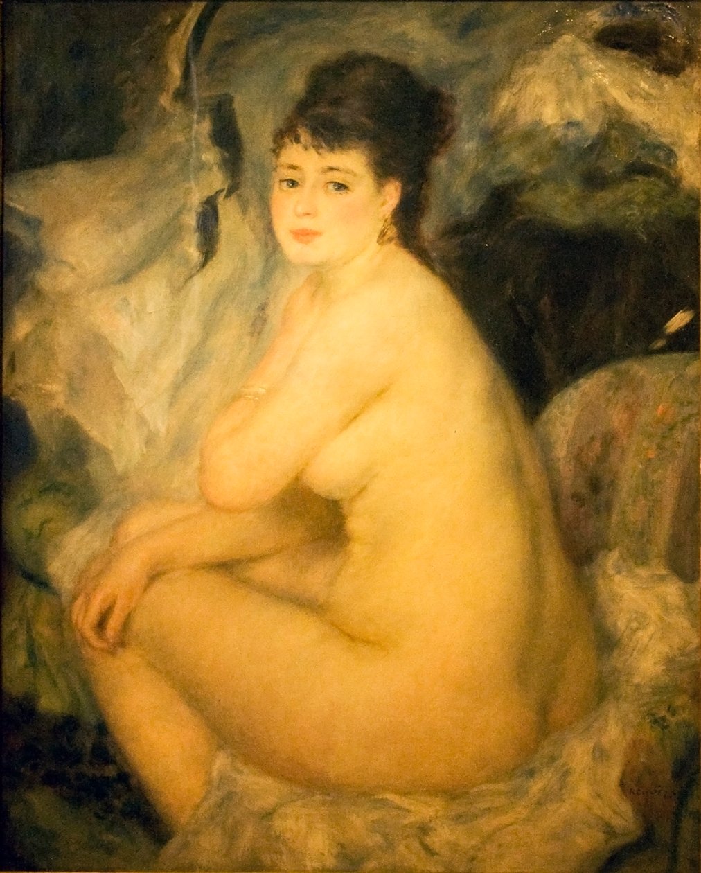 Naken kvinne sitter på en sofa Annan av Pierre Auguste Renoir