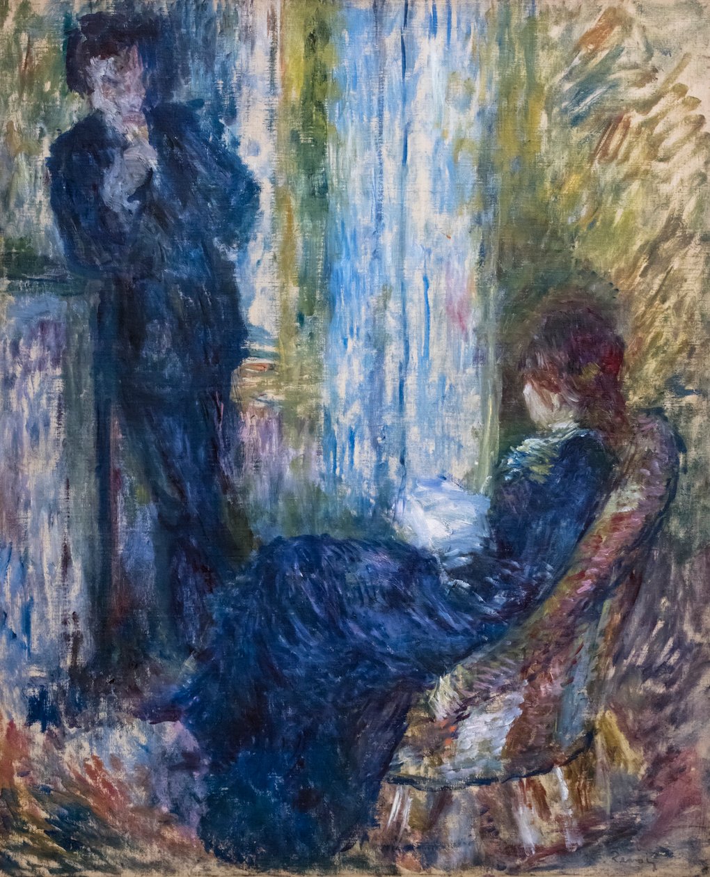 Ved peisen av Pierre Auguste Renoir