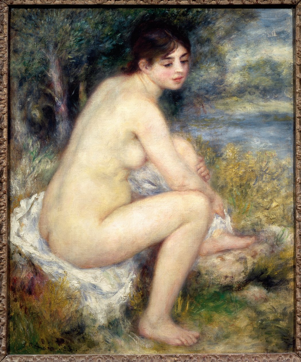 Naken kvinne i et landskap av Pierre Auguste Renoir
