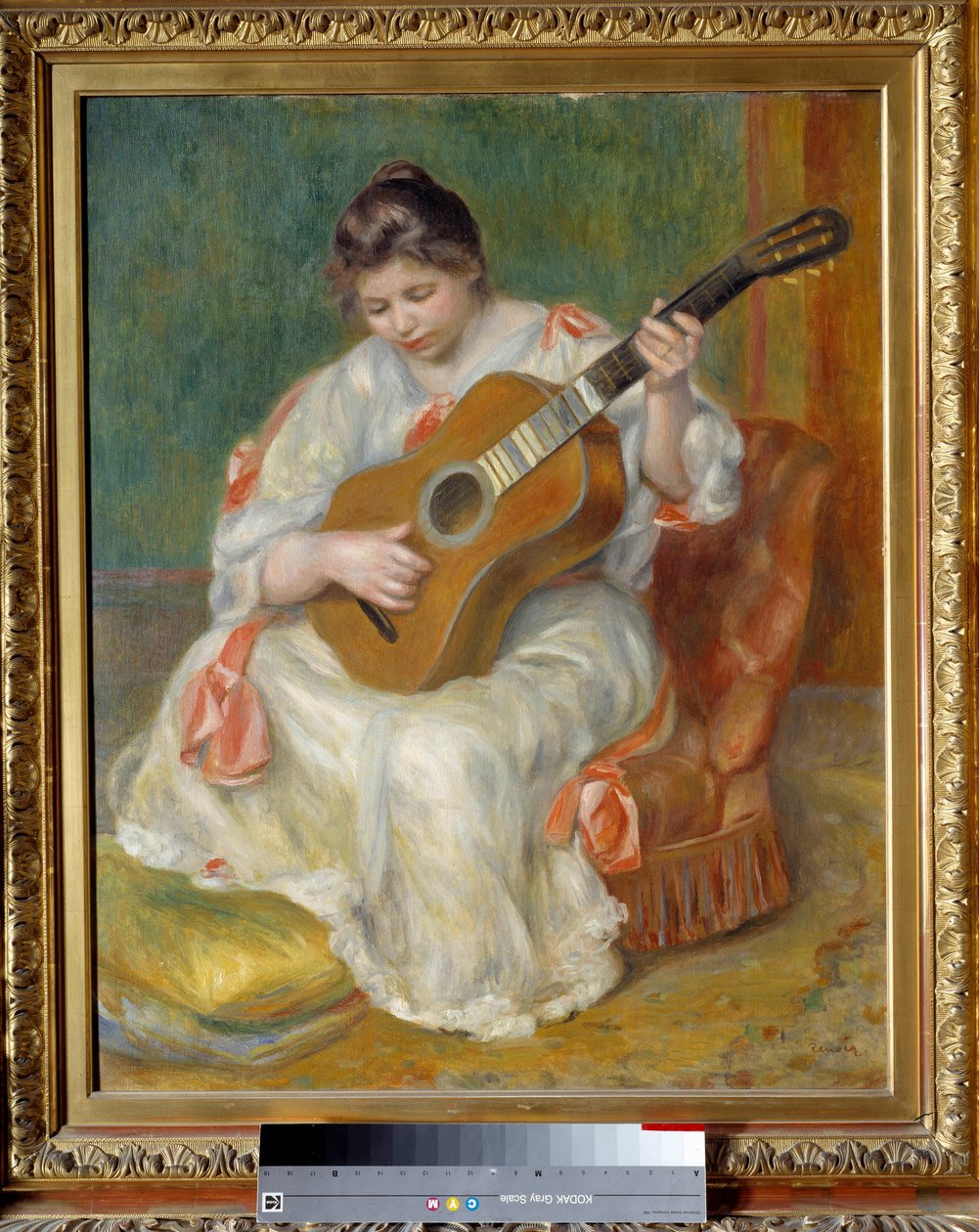 Kvinne som spiller gitar. Maleri av Pierre Auguste Renoir (1841-1919) av Pierre Auguste Renoir