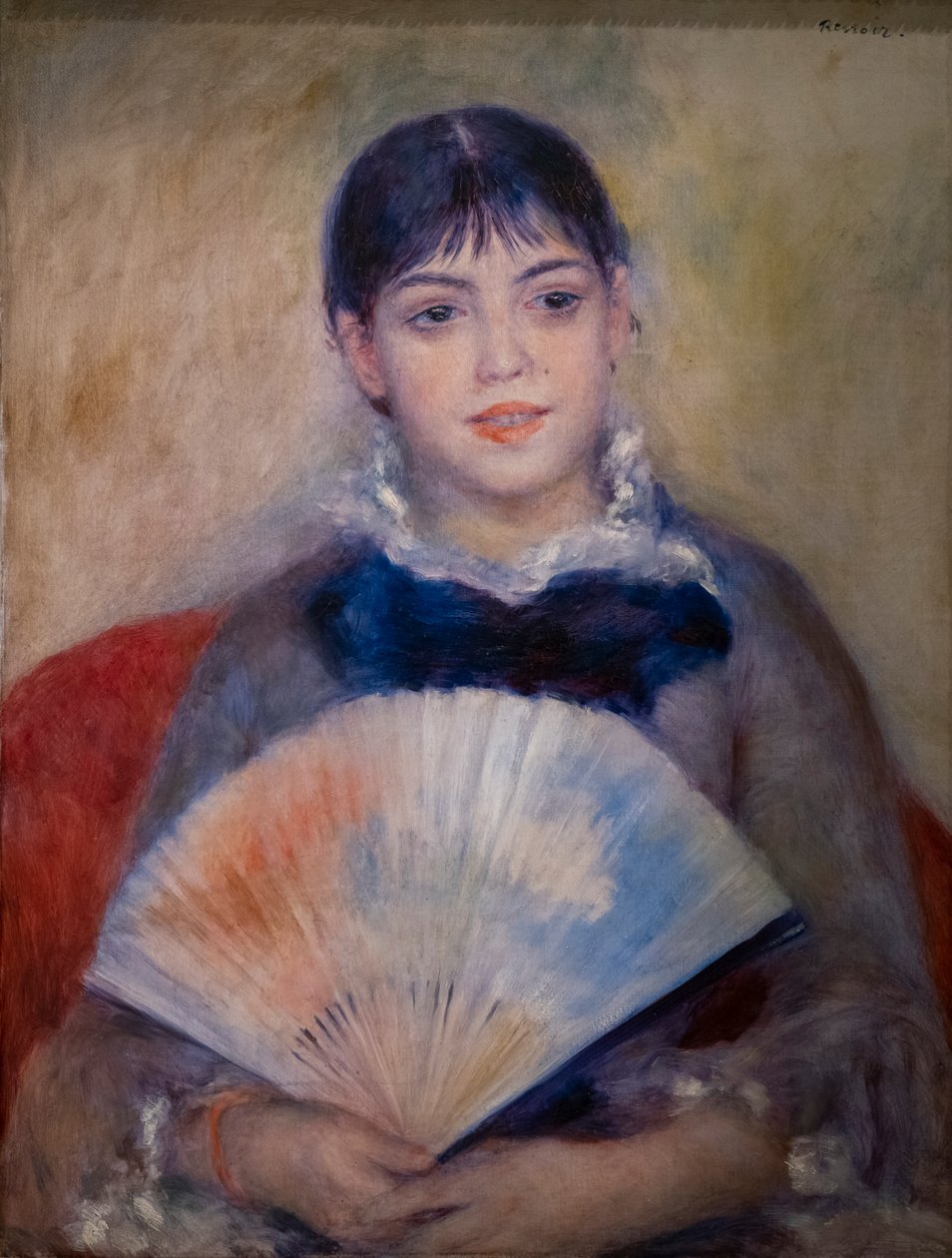 Ung kvinne med en fan av Pierre Auguste Renoir
