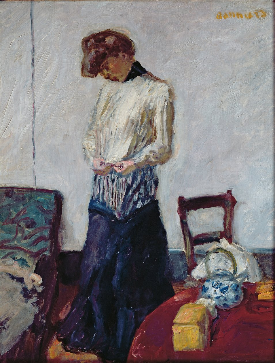 En kvinne som kler av seg av Pierre Bonnard