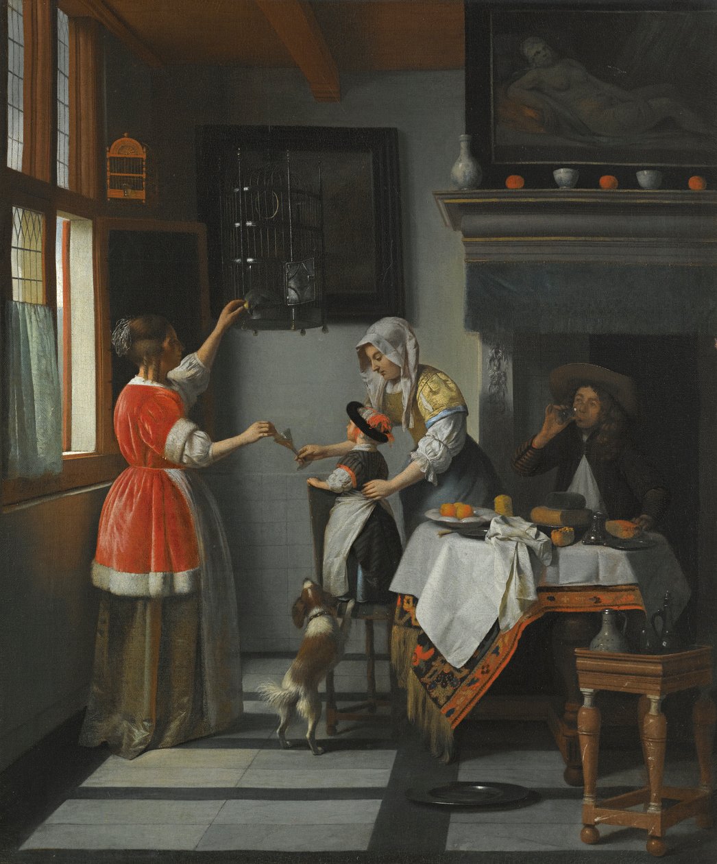 Interiør med et barn som mater en papegøye av Pieter de Hooch