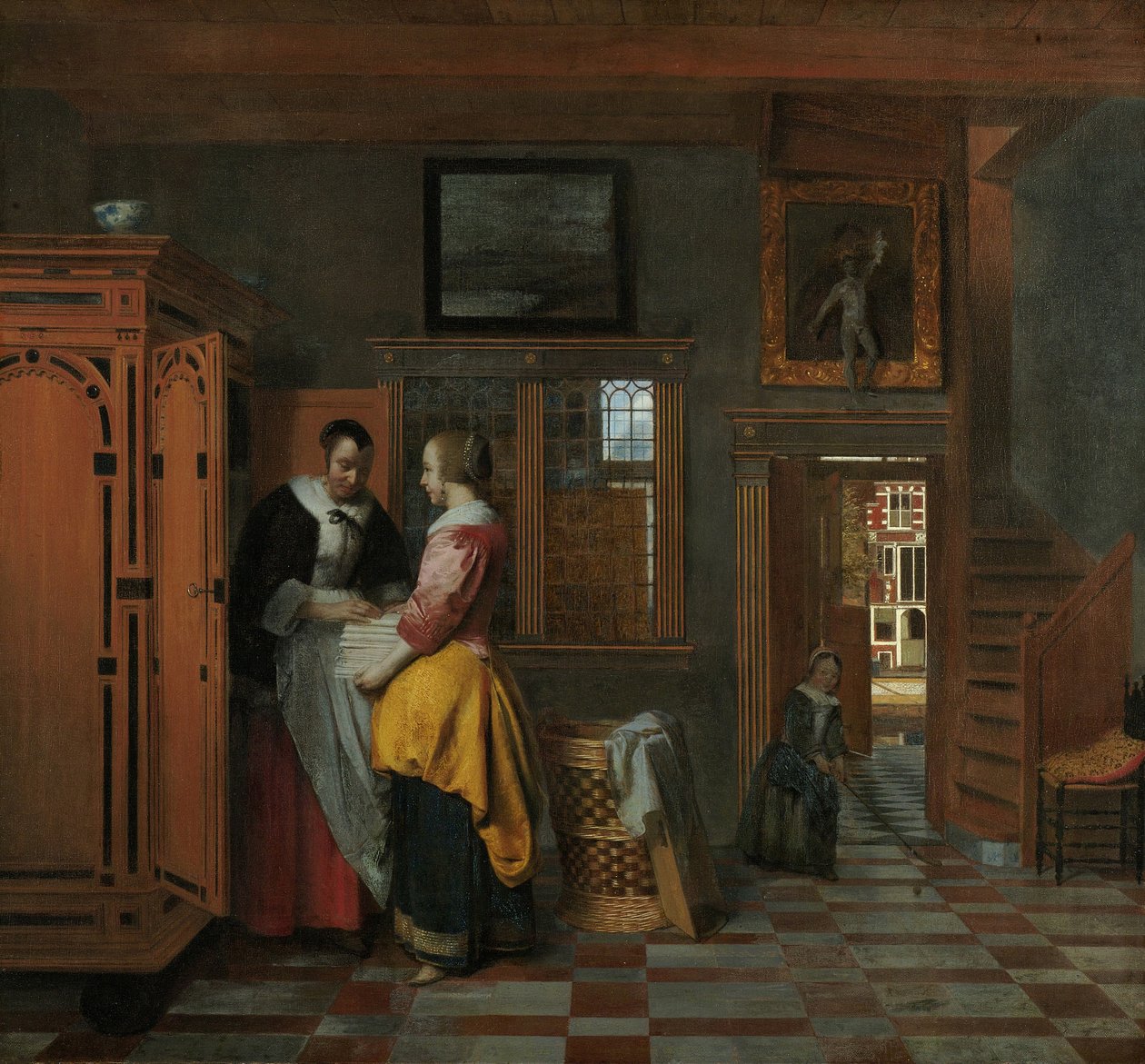 Interiør med kvinner ved siden av en linkiste, 1663 av Pieter Hooch de