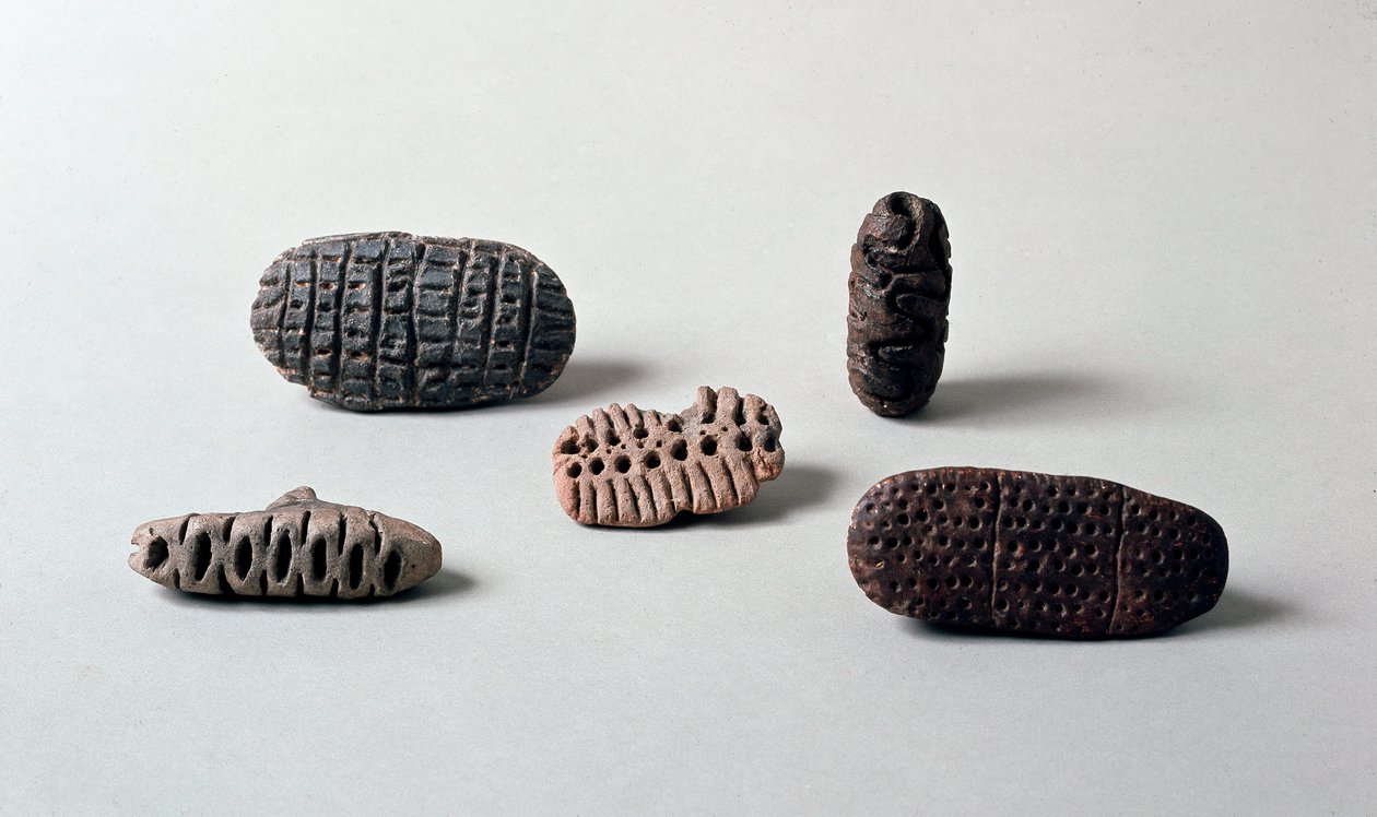Forhistorie: forskjellige pintaderas (sel) av neolittisk terrakotta fra Caverna Delle Arene til Candide (Liguria). Pegli, Villa Pallavicini-museet av Prehistoric Prehistoric