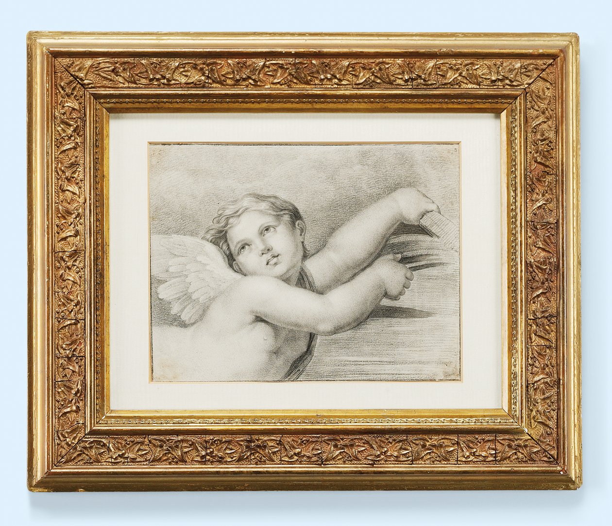 Hodet til en putto (svart kritt på papir) av after Raphael