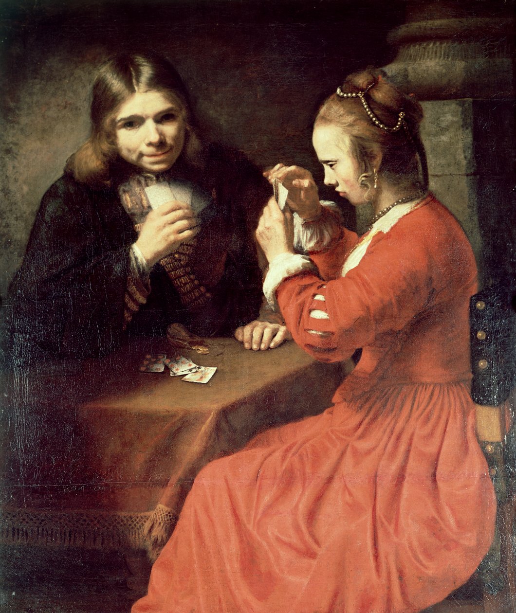 En ung mann og en jente spiller kort av Rembrandt van Rijn