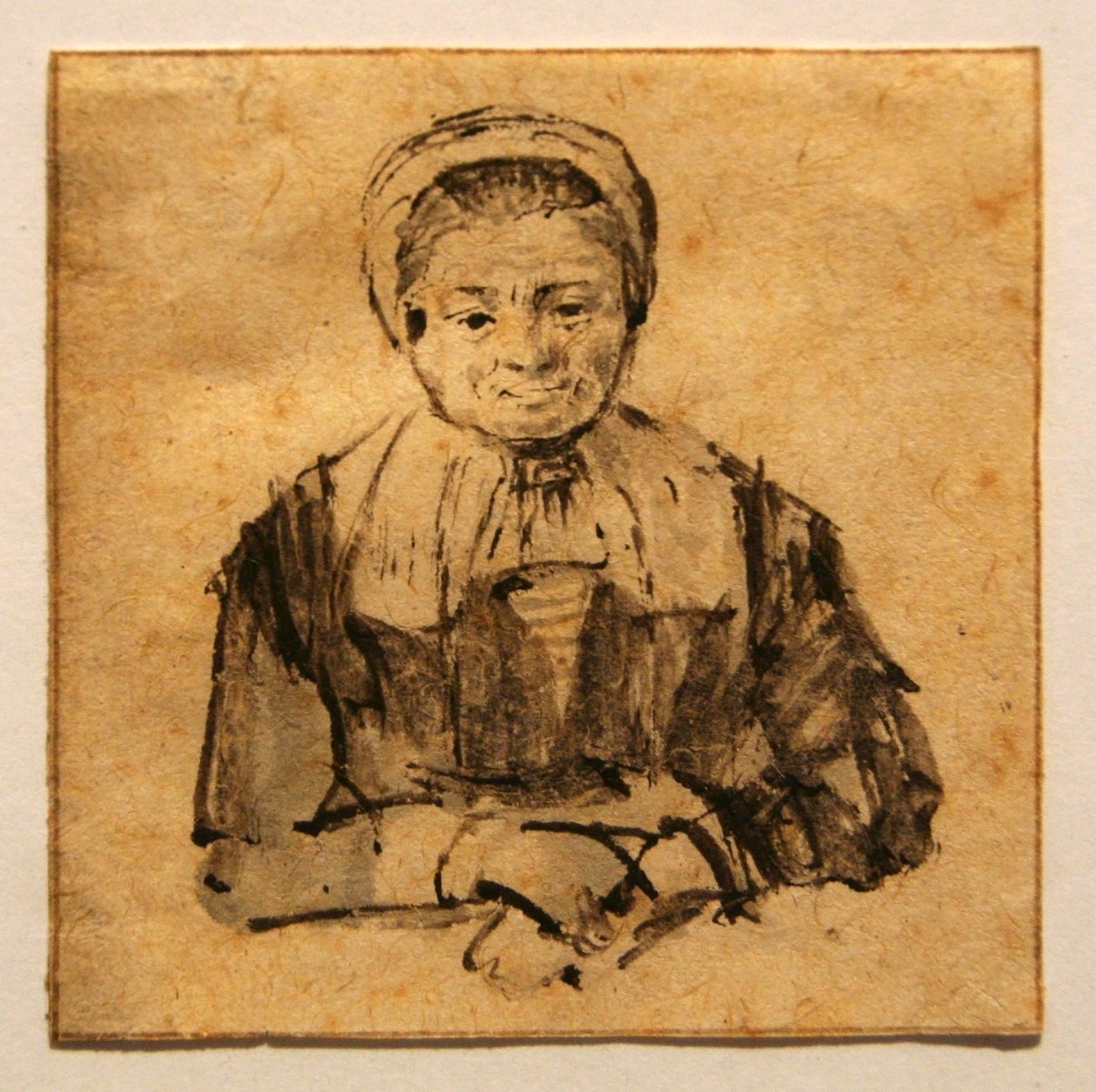 Gammel kvinne med brettede hender av Rembrandt van Rijn